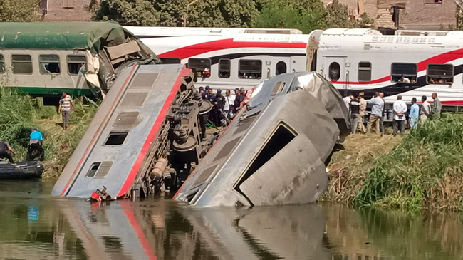 20 injured in Egypt train collision as carriages fall into canal