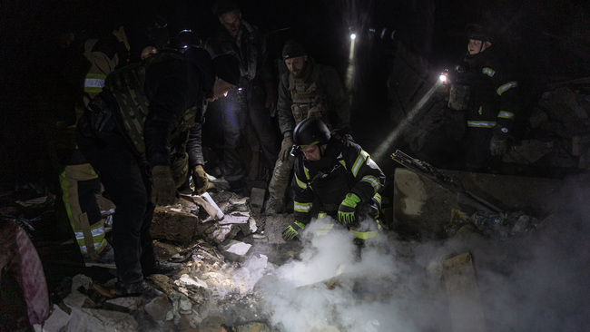 Civilians search for survivors after drone strike in Kramatorsk