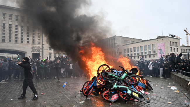 Clashes erupt between police and protesters during anti-government demonstrations in Brussels