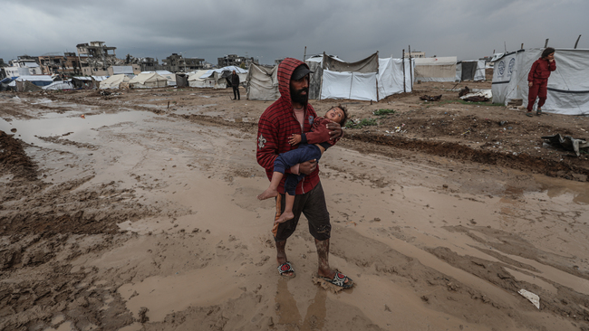 Heavy rains flood thousands of tents sheltering displaced civilians in Gaza
