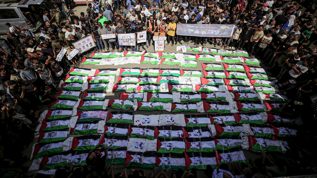 Mass funeral held in Gaza City after over 100 bodies recovered from rubble in Al-Zaytoun