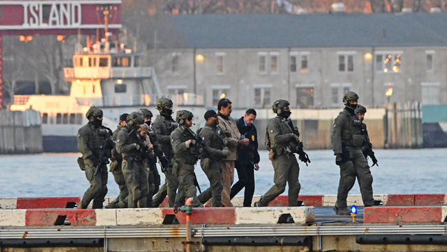 Nicolas Maduro surrounded by armed police during transfer to New York court